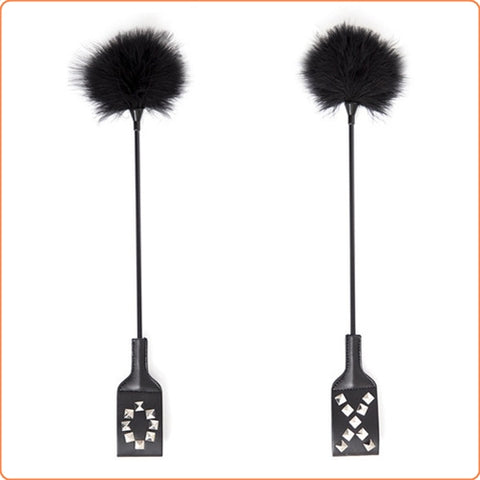 Feather tickler with paddle