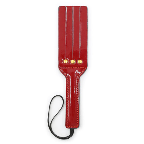 Bright leather spanking paddle