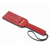 Bright leather spanking paddle