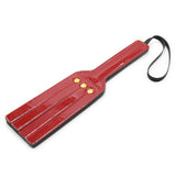 Bright leather spanking paddle